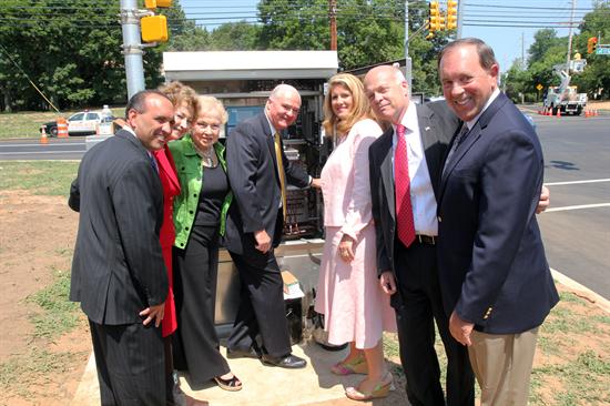 Assisting with the traffic light turn on at the intersection of County Route 537 and Gravel Hill Road were Freeholder Deputy Director Thomas A. Arnone, Freehold Committeewoman Barbara J. McMorrow, Freeholder Lillian G. Burry, Freeholder Director John P. Curley, Freeholder Serena DiMaso and Freehold Committeeman Robert McGirr.